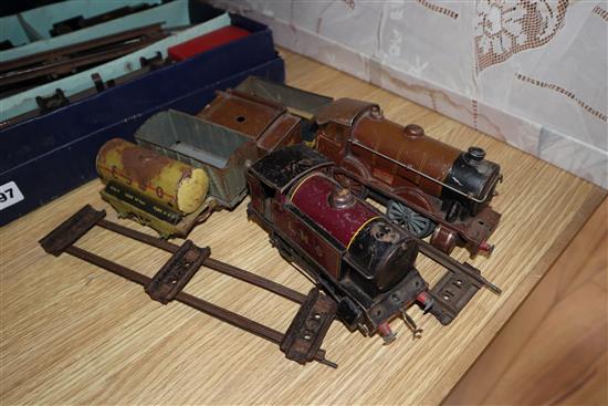 A quantity of mixed locos, track and carriages including Hornby